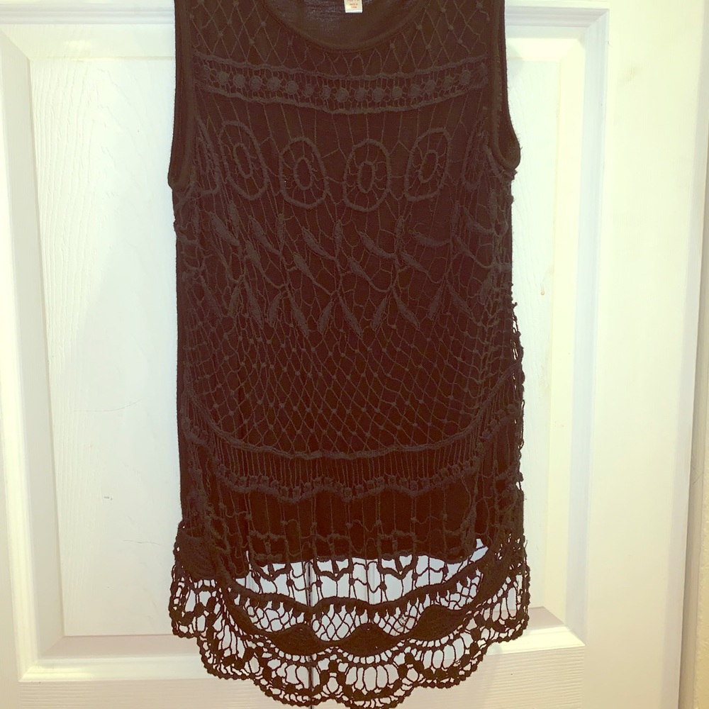 Tank top XL/TG. Fits like a medium size to me